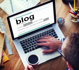 Blog, Laptop, Coffee, Man reading blog, Digital Marketing